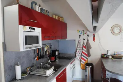 Cuisine ou kitchenette dans l'établissement Le Logis du Vendangeur