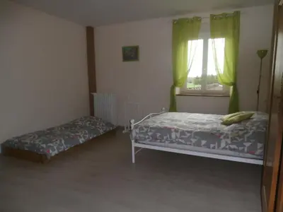 Un ou plusieurs lits dans un hébergement de l'établissement Gîte aux Portes de l'Argonne