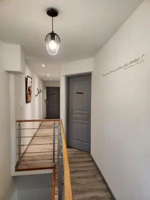 Un ou plusieurs lits dans un hébergement de l'établissement Appartement calme Le clos de Renée