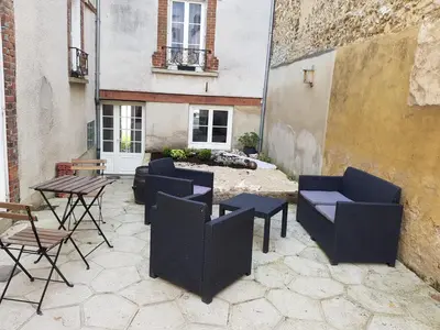 Coin salon dans l'établissement Appartement calme Le clos de Renée