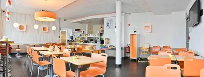 Restaurant ou autre lieu de restauration dans l'établissement ibis budget Saint-Quentin Centre Gare