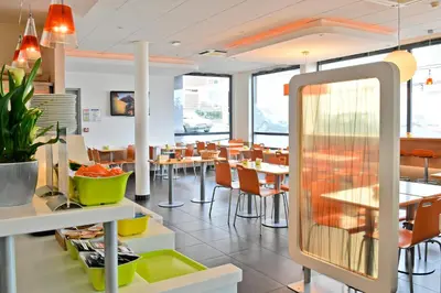 Restaurant ou autre lieu de restauration dans l'établissement ibis budget Saint-Quentin Centre Gare