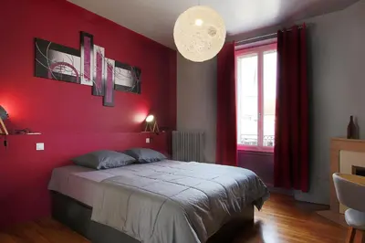Un ou plusieurs lits dans un hébergement de l'établissement L'Iliade - Chambres d'hôtes - B&B à Bouzy