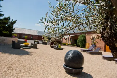 Jardin de l'établissement Le Prieuré Chambres d'hôtes
