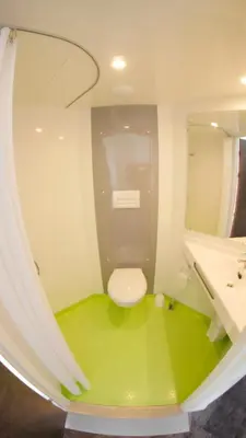 Salle de bains dans l'établissement Hôtel du Tramway