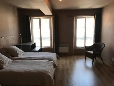 Un ou plusieurs lits dans un hébergement de l'établissement Aux Delices de l'Abbaye