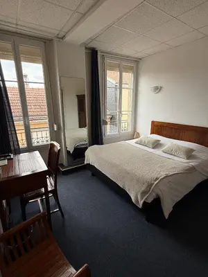 Un ou plusieurs lits dans un hébergement de l'établissement Hotel du Pot d'Etain