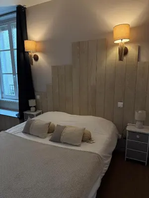 Un ou plusieurs lits dans un hébergement de l'établissement Hotel du Pot d'Etain