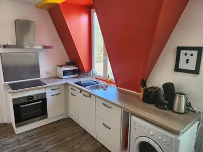Cuisine ou kitchenette dans l'établissement Le logis de Tania - 2 chambres - Rue calme dans centre ville