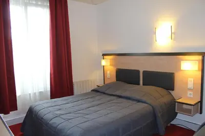 Un ou plusieurs lits dans un hébergement de l'établissement Hôtel de la Meuse