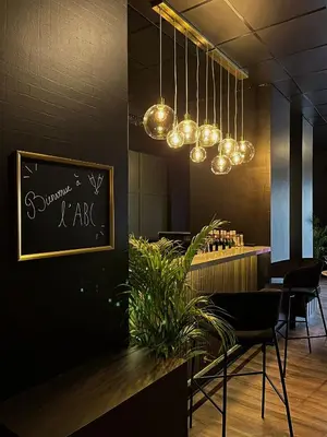 Coin salon dans l'établissement HOTEL & SPA Le Renard Centre