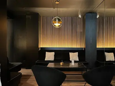 Coin salon dans l'établissement HOTEL & SPA Le Renard Centre