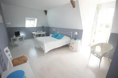 Un ou plusieurs lits dans un hébergement de l'établissement Grand gîte 15 personnes, 9 chambres, 100km de Paris en Exclusivité