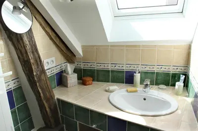 Salle de bains dans l'établissement Chambres d'hôtes de la Fontaine