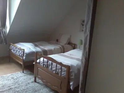 Un ou plusieurs lits dans un hébergement de l'établissement maison du Hérisson
