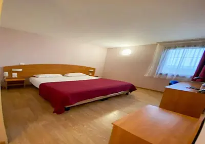 Un ou plusieurs lits dans un hébergement de l'établissement Contact Hôtel - Prim Witry - Reims Nord