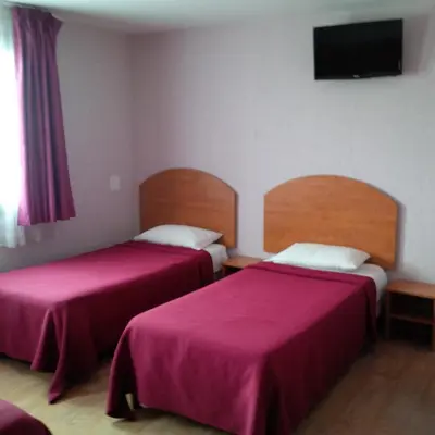 Un ou plusieurs lits dans un hébergement de l'établissement Contact Hôtel - Prim Witry - Reims Nord