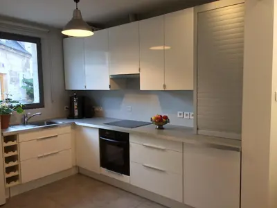 Cuisine ou kitchenette dans l'établissement Le Gîte du Château