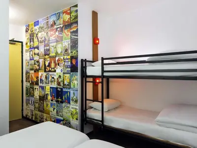 Un ou plusieurs lits dans un hébergement de l'établissement Hôtel F1 Reims Tinqueux