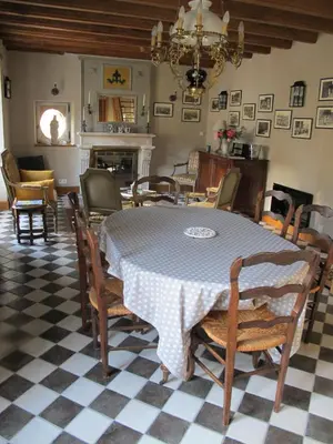 Coin salon dans l'établissement Gîte Le Relais Coq'Lys