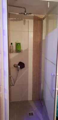 Salle de bains dans l'établissement Le Coq de Champagne