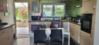 Cuisine ou kitchenette dans l'établissement Le Coq de Champagne