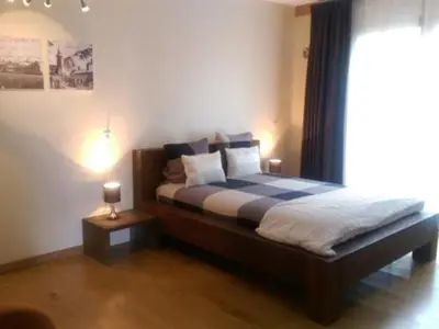 Un ou plusieurs lits dans un hébergement de l'établissement Le Chalet Champenois