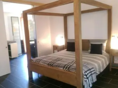 Un ou plusieurs lits dans un hébergement de l'établissement Le Chalet Champenois