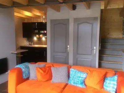 Coin salon dans l'établissement Le Chalet Champenois