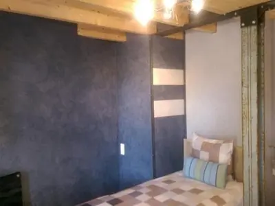 Un ou plusieurs lits dans un hébergement de l'établissement Le Chalet Champenois