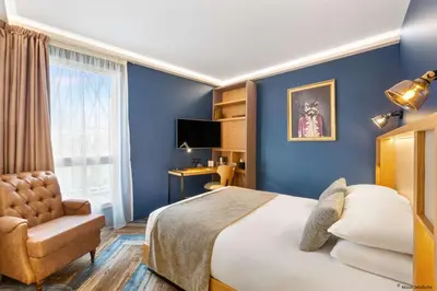 Télévision ou salle de divertissement dans l'établissement Aiden by Best Western T'aim Hotel & SPA
