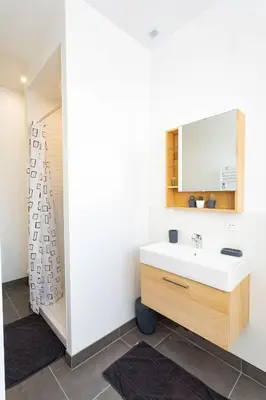 Salle de bains dans l'établissement Domaine du Vendangeoir - Les Chambres