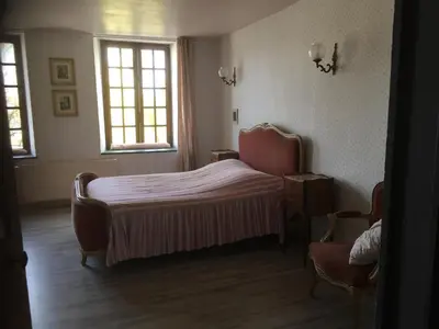 Un ou plusieurs lits dans un hébergement de l'établissement Chez Mémère Hélène