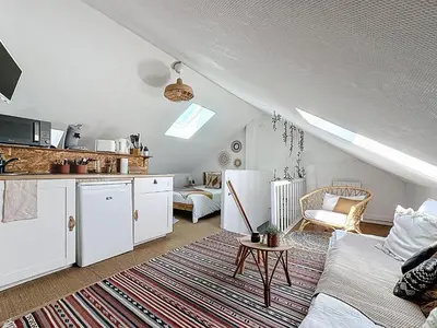 Cuisine ou kitchenette dans l'établissement Le cosy marnais, centre ville, vue cathédrale