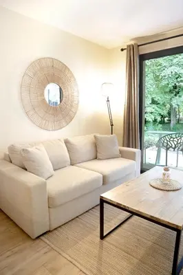 Coin salon dans l'établissement Le Parc du Château