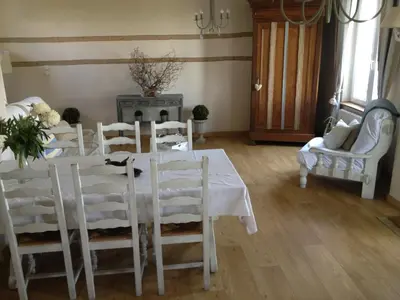 Coin salon dans l'établissement Le Grand Gîte