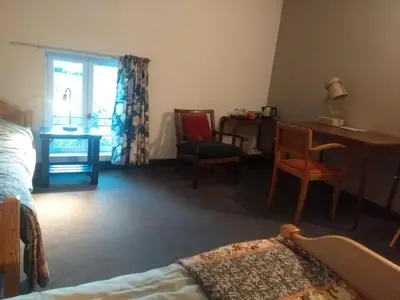 Un ou plusieurs lits dans un hébergement de l'établissement Chambre d'hôtes L'Ermite