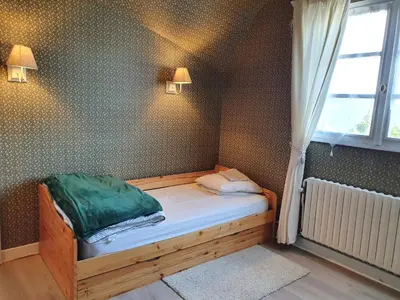 Un ou plusieurs lits dans un hébergement de l'établissement LA MAISON DU MUGUET - Accueil Chevaux - Horse Friendly