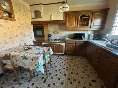 Cuisine ou kitchenette dans l'établissement Chez Karinette