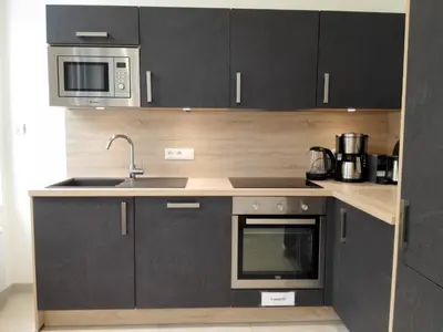 Cuisine ou kitchenette dans l'établissement DELARNOR - Confort et sérénité