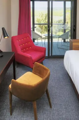 Un ou plusieurs lits dans un hébergement de l'établissement Hôtel Restaurant Les Grains d'Argent Dizy - Epernay