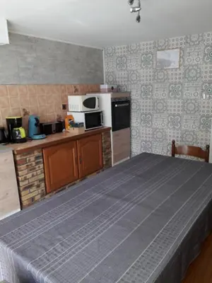 Cuisine ou kitchenette dans l'établissement GITE ANNA