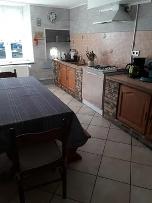 Cuisine ou kitchenette dans l'établissement GITE ANNA