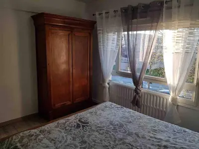 Un ou plusieurs lits dans un hébergement de l'établissement BedinReims cozy apartment parking and wifi free ideal 4 Adultes et 2 Enfants