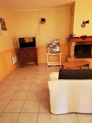 Télévision ou salle de divertissement dans l'établissement Le Bois du Gart