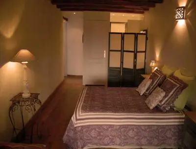 Un ou plusieurs lits dans un hébergement de l'établissement La Grange aux Loirs B&B