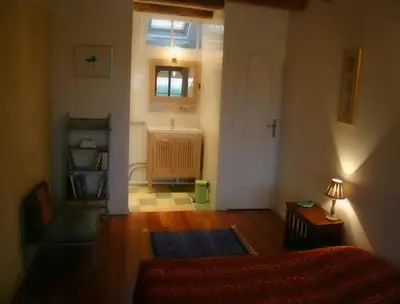 Un ou plusieurs lits dans un hébergement de l'établissement La Grange aux Loirs B&B