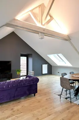 Coin salon dans l'établissement L'appartement et les Suites de VJL...