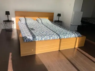 Un ou plusieurs lits dans un hébergement de l'établissement Chambre Quadruple Avec 4 Couchages - Proche Disneyland Paris