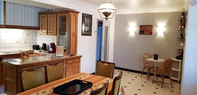 Cuisine ou kitchenette dans l'établissement La Dimanche